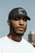 Load image into Gallery viewer, Black is Dope Trucker hat
